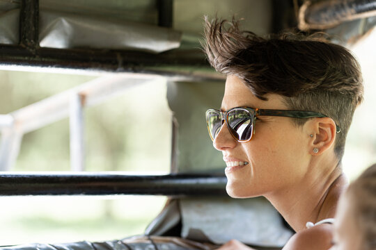 woman in jeep on safari in africa