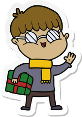 Obraz na płótnie Canvas sticker of a cartoon boy wearing spectacles carrying gift