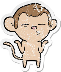 distressed sticker of a cartoon suspicious monkey