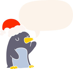 cute cartoon christmas penguin and speech bubble in retro style