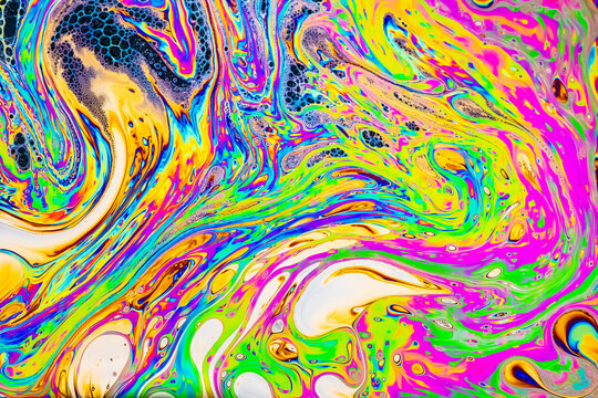 Artistic abstraction with patterns of multicolored substances.