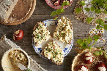 Slices of bread with bread spread made of hard boiled Easter eggs