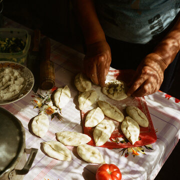 The old woman makes dumplings