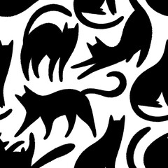 Seamless pattern with black cats on white background. Silhouettes of cats.