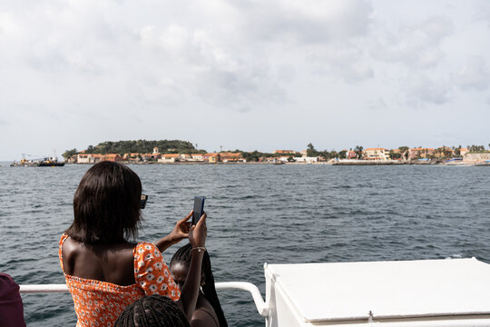 woman taking photo of gore island