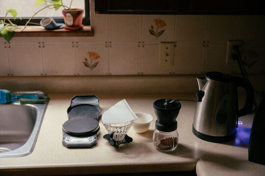 Coffee making setup on kitchen counter.
