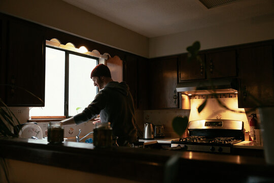 Making coffee in the morning in the kitchen.