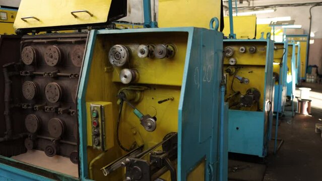Industrial manufacturing, Factory machines, Equipment customization. Industrial manufacturing involves diverse machinery to produce goods in factory setting.