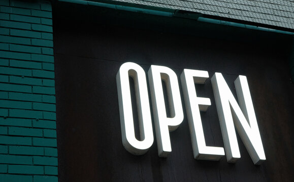 Neon Sign - "Open" on a Building