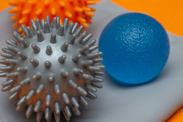 .two small pilates balls on an elastic band