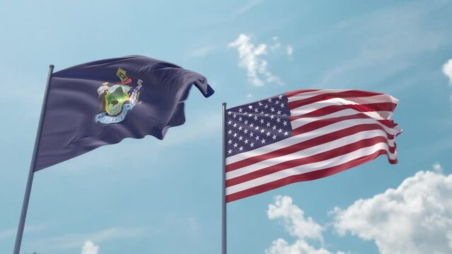 Maine and the USA on a flagpole realistic wave on strong wind in blue sky. State of Maine and The United States of America
