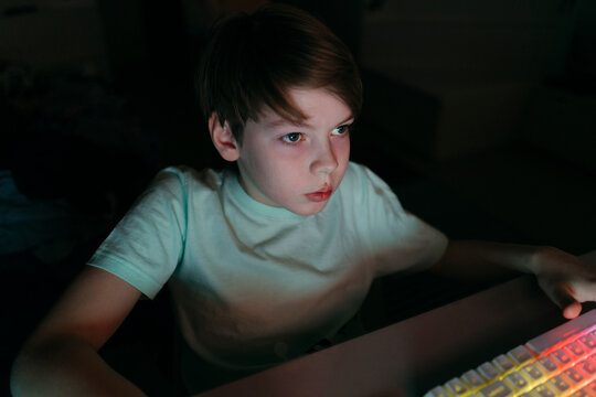 Boy playing video game.