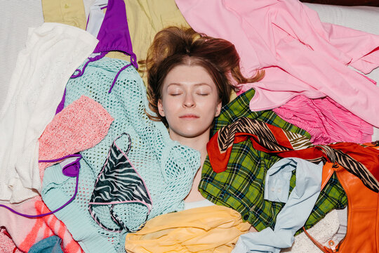 Woman buried in fashion clothing