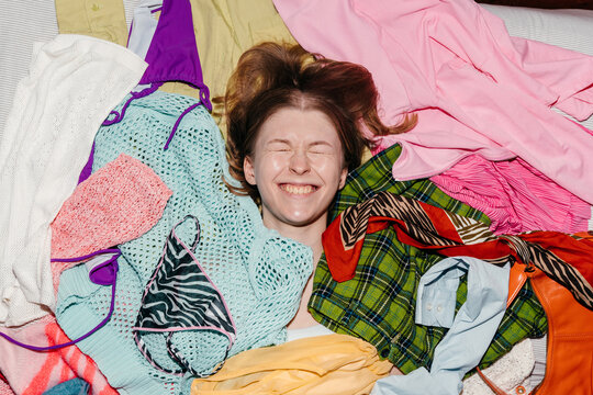 Woman buried in fashion clothing