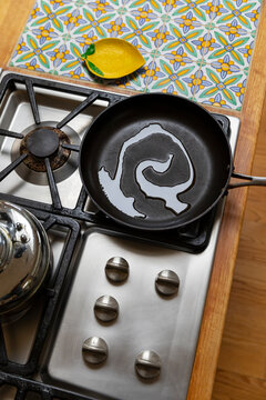 Olive oil in Frying Pan in Kitchen with nobody
