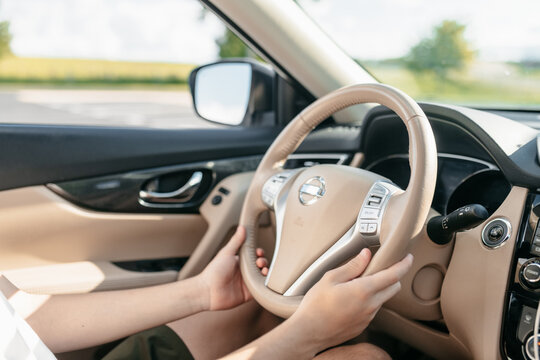 Practice driving in a parking lot.