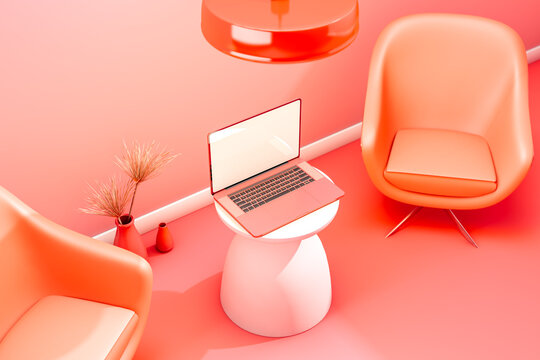 Pink interior with a laptop on a table