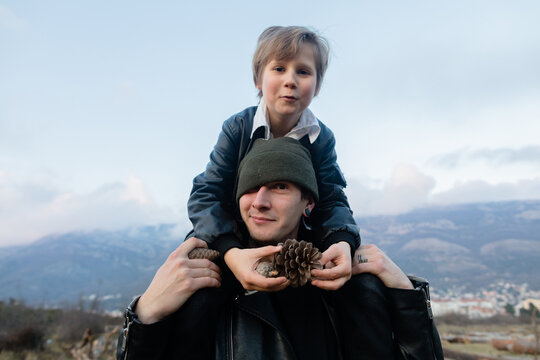 Yong father and his kid outdoors