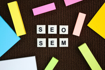 alphabet letters with SEO and SEM. Concept for Search Engine Optimization and Search Engine Matketing