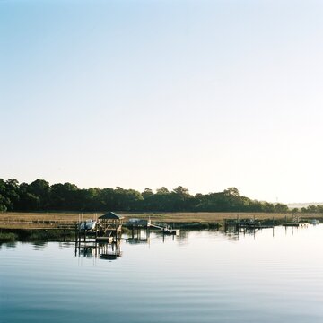 Film Image of a dock on a creek on a sunny day
