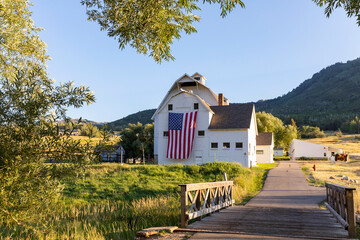 Park City Utah Barn farm landscape with American Flag