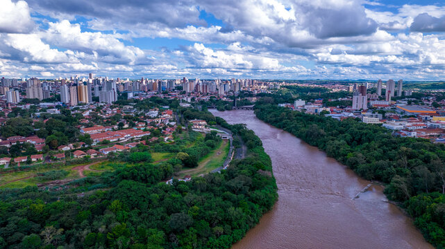 Aerial view of the city of Piracicaba, in Sao Paulo, Brazil. Piracicaba River with trees, houses and offices