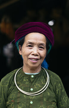 Portrait of an older Hmong woman in traditional clothing. Local people