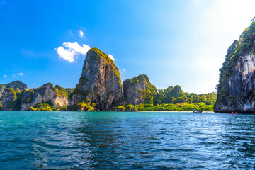 Huge cliff rocks in azure water, Railay beach, Ao Nang, Krabi, Thailand