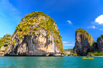 Obraz premium Huge cliff rocks in azure water, Ko Rang Nok, Ao Phra Nang Beach, Ao Nang, Krabi, Thailand