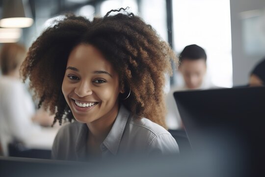 Smiling african american woman working on laptop while sitting in office. Generative ai