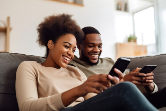 Happy african american couple relax on comfortable couch at home texting messaging on smartphone. Generative ai