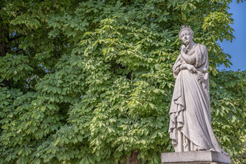 Fototapeta premium Beautiful antique, historical statue in the free public park, the Luxembourg Gardens, in Paris, France.