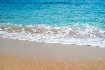 Fototapeta na wymiar Summer Emerald sea foam and beach sand