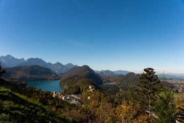 Fototapeta na wymiar Lake near Neuschwanstein castle during autumn with perfect clear sky