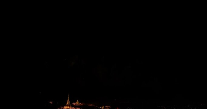 aerial view Stunning fireworks over the hilltop palace in the heart of Phetchaburi, Thailand. .Fireworks dazzling. Annual Festival of City Lights and Fireworks.decorative lights background.