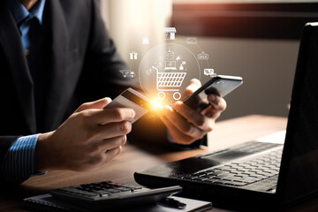 online shopping concept, businessman use smartphones and credit cards to purchase products from...