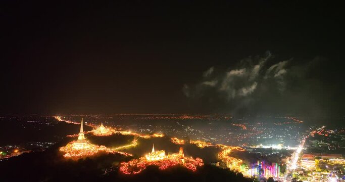 aerial view The lights decorate the palace and the pagoda at the top of the mountain at night, .beautiful and spectacular..An annual festival of city lights and fireworks..Colorful lights decorate .