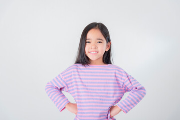 Fototapeta premium Image of Asian child posing on white background
