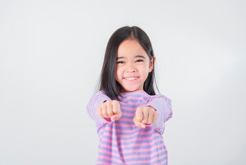 Image of Asian child posing on white  background