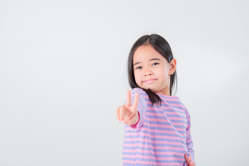 Image of Asian child posing on white  background