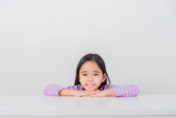 Image of Asian child posing on white  background