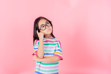 Image of Asian child posing on Pink background