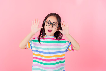 Image of Asian child posing on Pink background