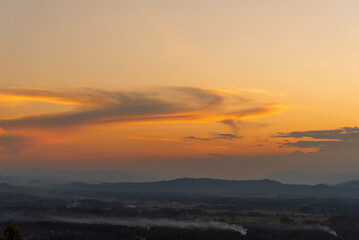 Sunset mountain range beautiful landscape mist, dusk golden time dramatic sky. Beautiful landscape high mountain ridge mist panning panorama scenery dawn dramatic sky. Sunrise landscape mountain peak.