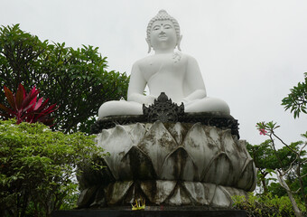 Buddha statue around Brahmavihara-Arama, Buddhist temple in Lovina, Bali, Indonesia.