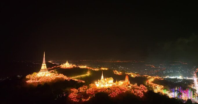 aerial view The lights decorate the palace and the pagoda at the top of the mountain at night, .beautiful and spectacular..An annual festival of city lights and fireworks..Colorful lights decorate .
