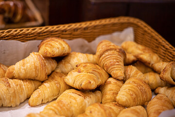 Croissants placed in several baskets