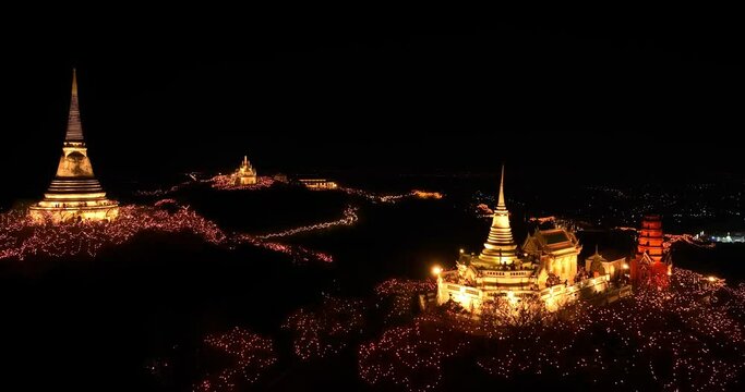 aerial view The lights decorate the palace and the pagoda at the top of the mountain at night, .beautiful and spectacular..An annual festival of city lights and fireworks..Colorful lights decorate .