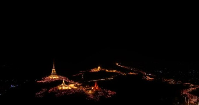 aerial view The lights decorate the palace and the pagoda at the top of the mountain at night, .beautiful and spectacular..An annual festival of city lights and fireworks..Colorful lights decorate .