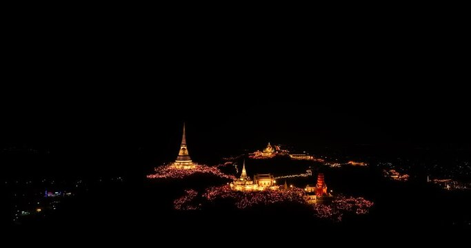 aerial view The lights decorate the palace and the pagoda at the top of the mountain at night, .beautiful and spectacular..An annual festival of city lights and fireworks..Colorful lights decorate .